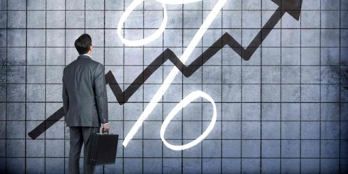 https://www.realestatescanada.com/wp-content/uploads/2023/12/Canadas-Interest-Rate-Hikes_2_11zon.webp